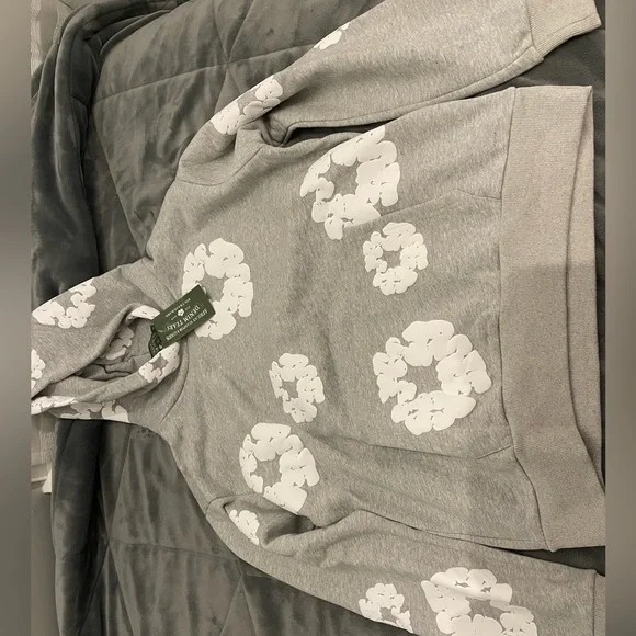 Brand new! Grey Denim tears hoodie with all tags and authentication.